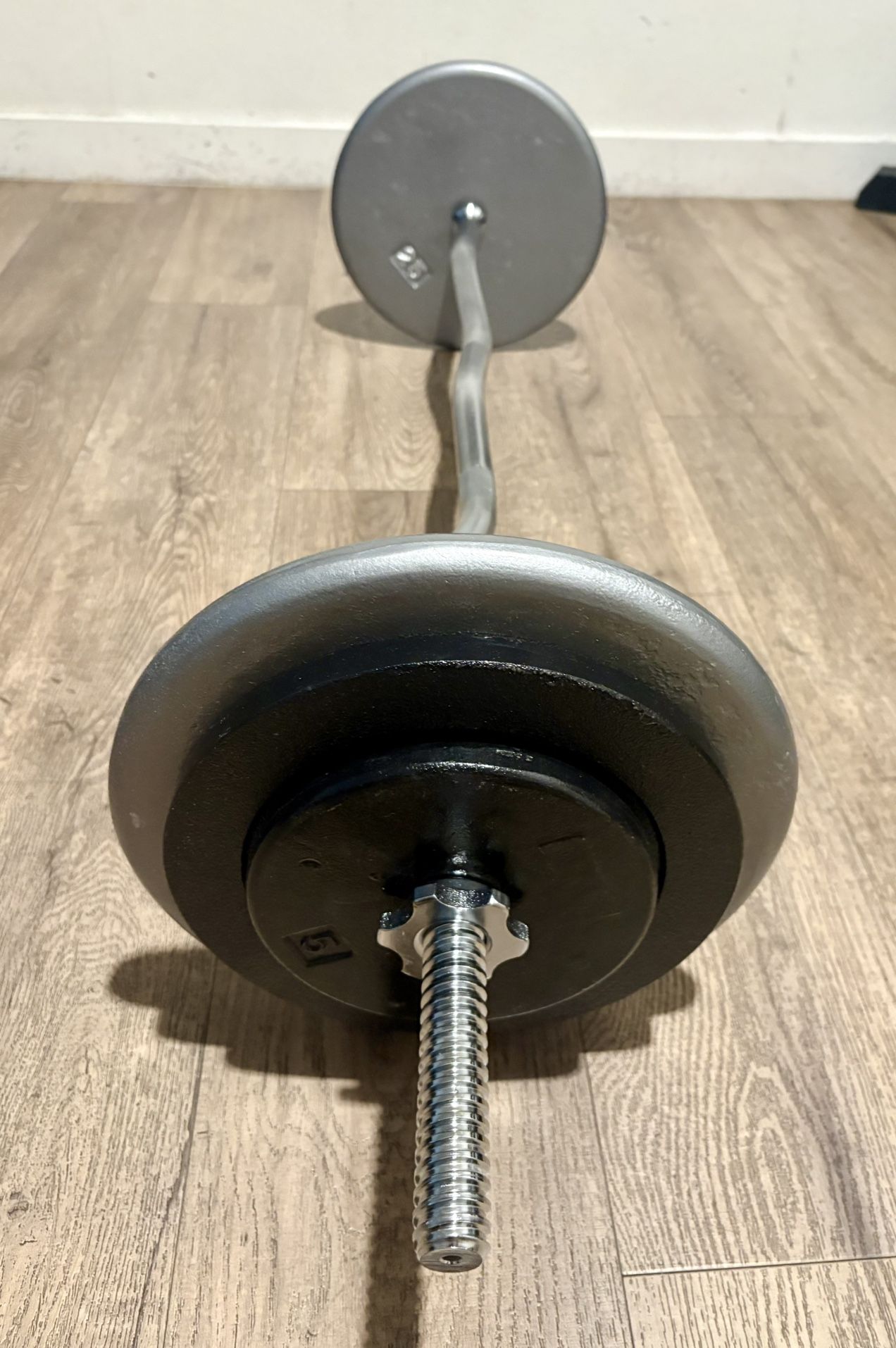 Curl Bar Standard With Pairs Of 25s 10s And 5 lbs Total: 94 lbs