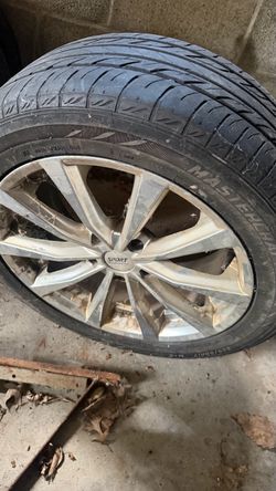 4 used tires with rim