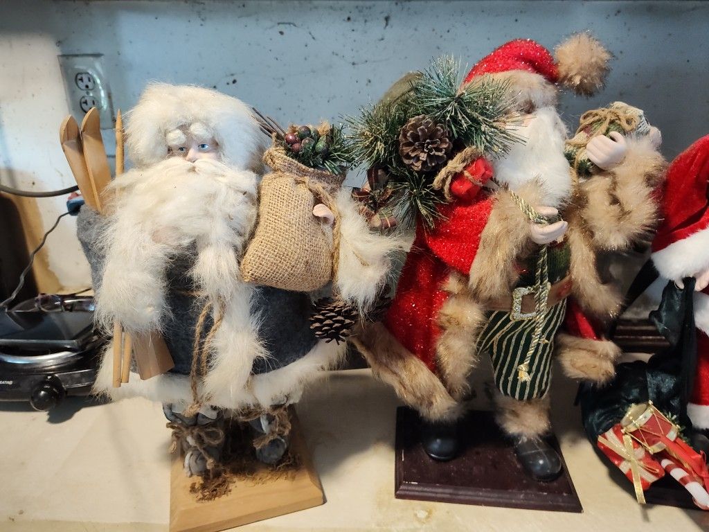 3 19" Santa Claus, And The One On Fare Right Is A Christmas Top These Things Things Are Made Very Well $75.00
