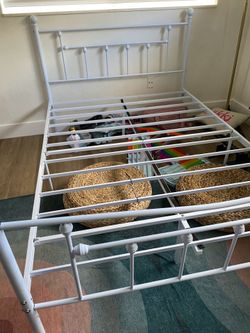 White iron full size bed great condition 75 need gone today no mattress