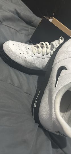 White and black Air Force 1’s  size 11.5