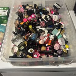 Tubs Of Gel, Nail Polish, And Color Acrylic