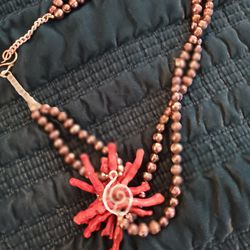 Grey Beads With a Orange Coral Flower