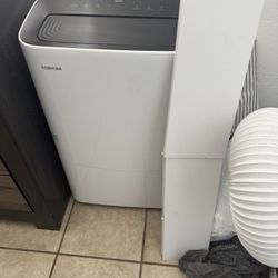8,000 (DOE) BTU Portable Air Conditioner Cools 350 sq. ft. with Dehumidifier and Remote Control in White