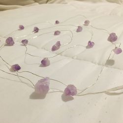 Raw Pieces Of Amethyst Adhered To A Strand Of LED Lights With Settings And On Off Switch! Takes AA (3)