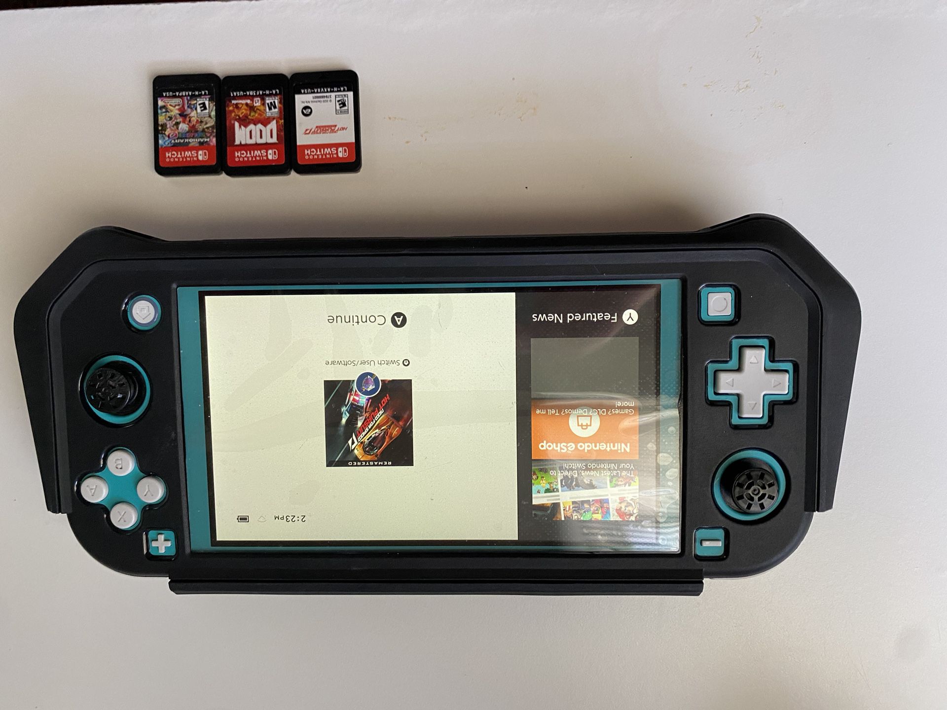 Nintendo Switch Lite W/ Case And 3 Games