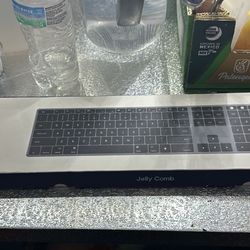 Jelly Comb Backlit Keyboard - brand new condition (in a box)