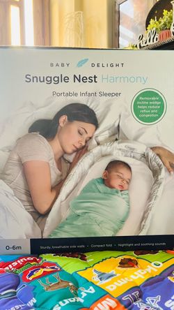 Snuggle Nest portable Infant Sleeper $20