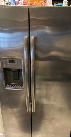 GE Fridge, range, Microwave, Washer & Dryer Stack.