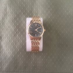 gold watch never used works