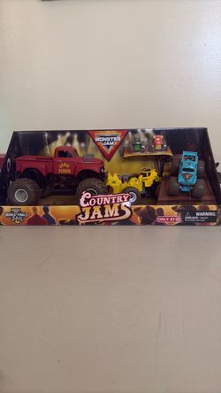 Country jams, monster trucks in package broken cardboard logo includes all monster trucks