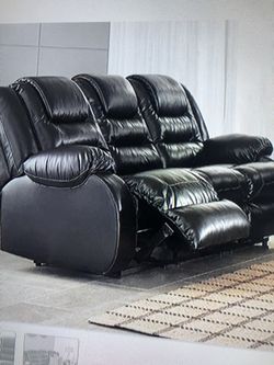 Reclining sofa with a matching chair