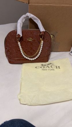 Coach crossbody with charm