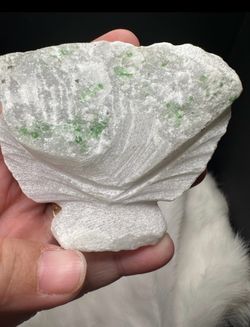 Green spinel in white marble