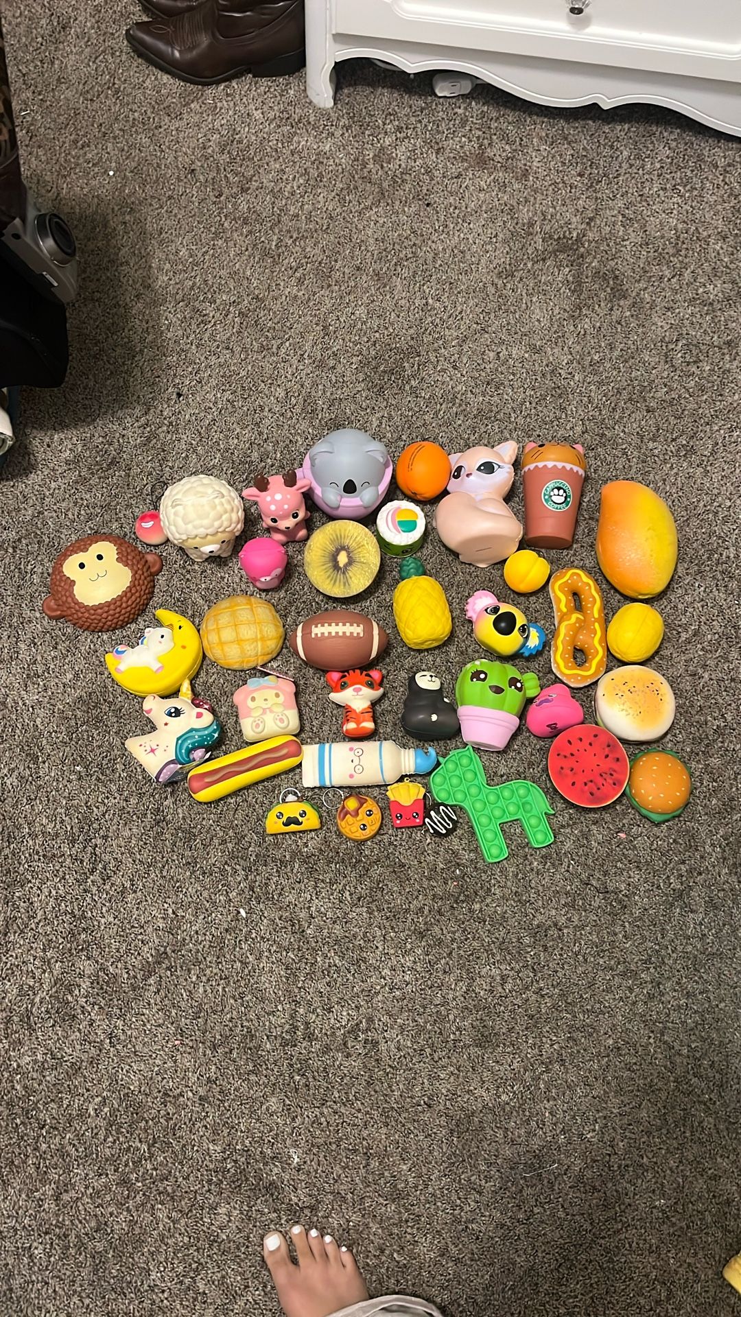 30+ selection of squish toys + 1 pop toy