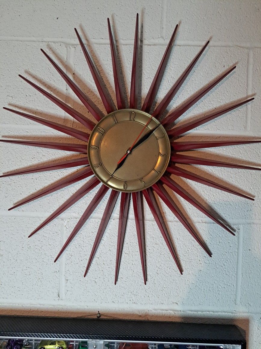 Old antique starburst clock