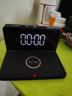 Alarm and wireless charger