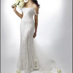 Luxurious Mermaid Hem Sleeveless  Wedding Dress. Gorgeous Hand Made Lace All Over The Dress Decorated With Real AB Swarovski Crystals and White Perls.