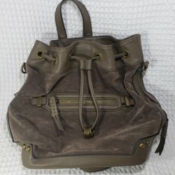 Chinese laundry green suede like backpack . Very good condition.  You can use as a backpack or converts to a purse with a long shoulder strap included