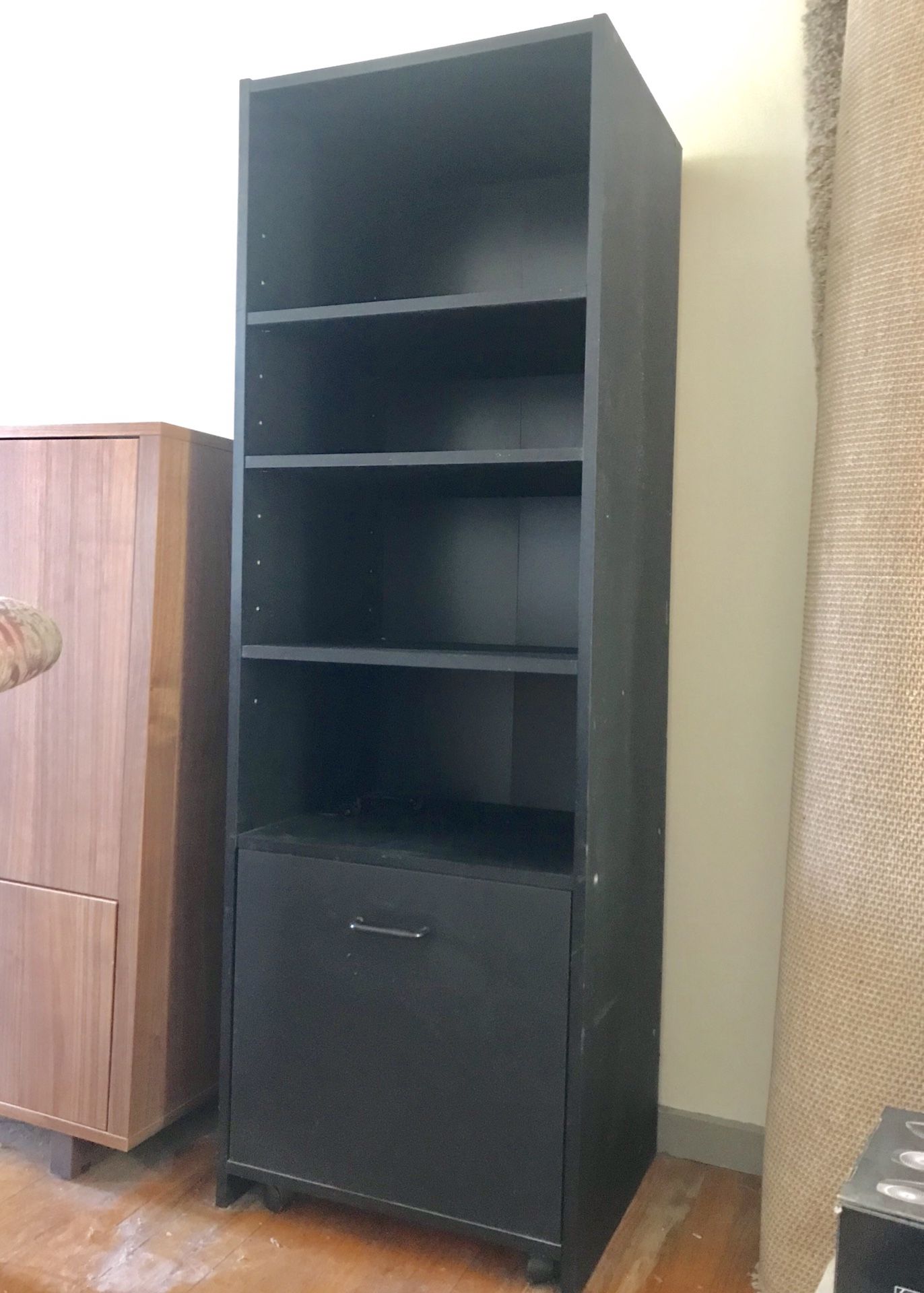 Home office shelves with slide-out file cabinet