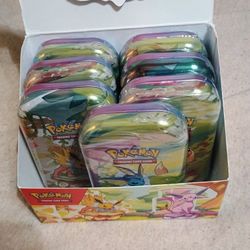 Prismatic Evolutions 7 Mini Tins And DISPLAY 