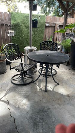 Iron Patio Table and 2 chairs.