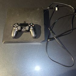 PS4 slim With Controllers And Wires.