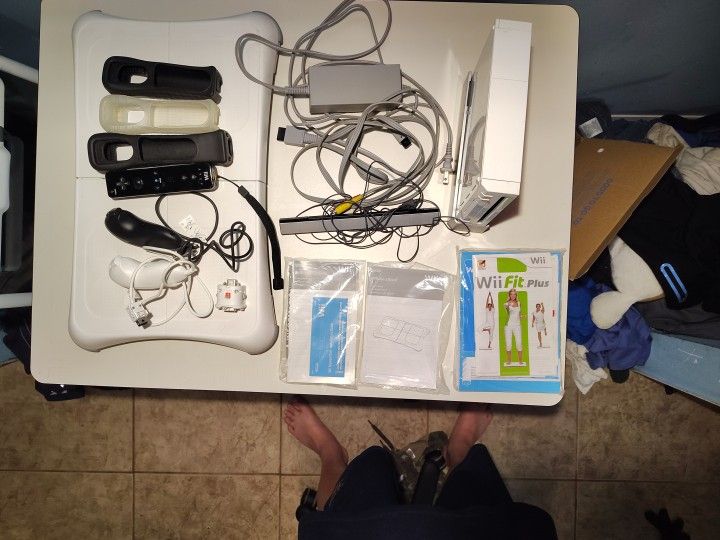 Nintendo Wii Bundle, With Balance Board, All Wires, Controller Covers, 2 Nunchucks One Controller Instruction Manuals
