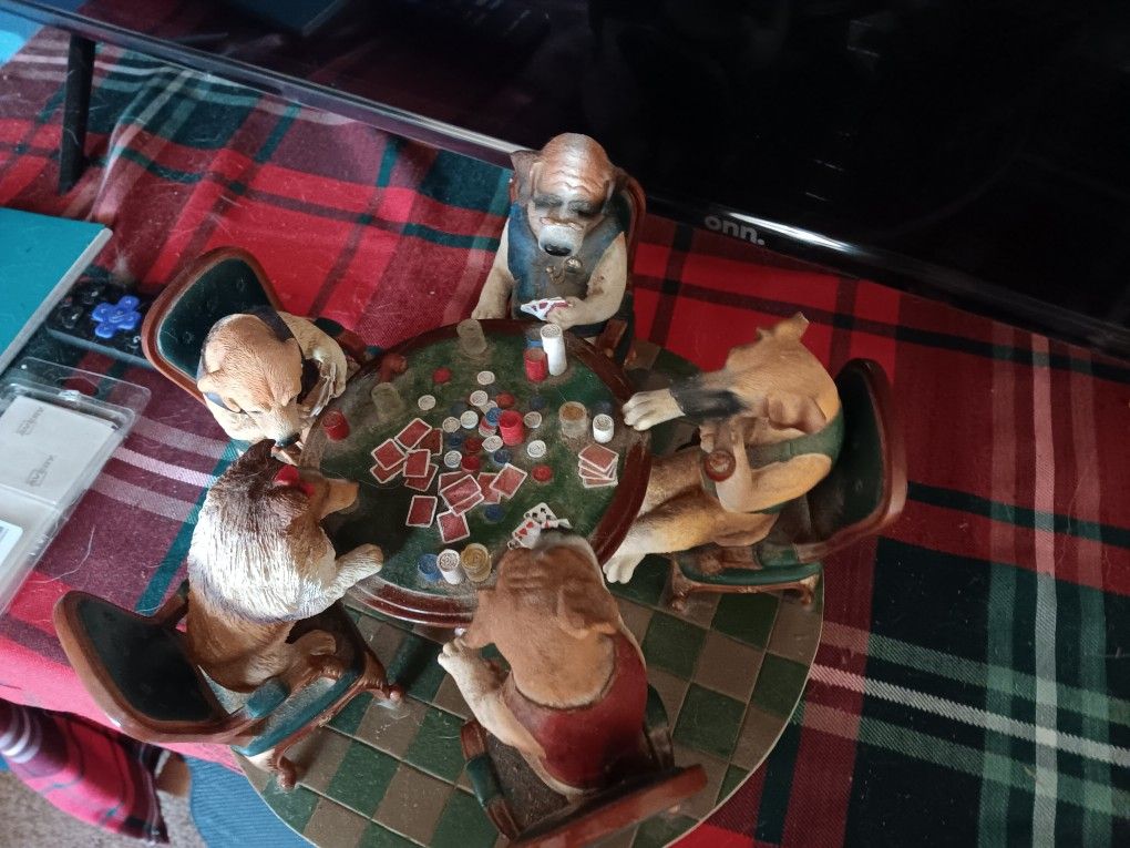 Vintage dogs playing poker statue
