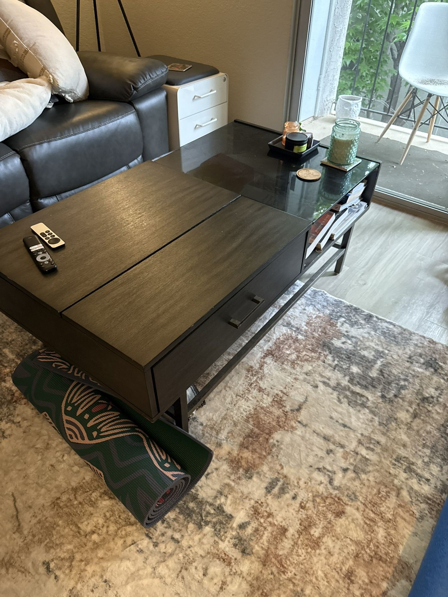 Coffee table with popup surface