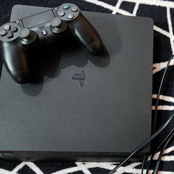 PS4 slim 1TB preowned mint condition. 
