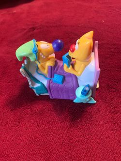 1999 Burger King toy cat and dog in bed