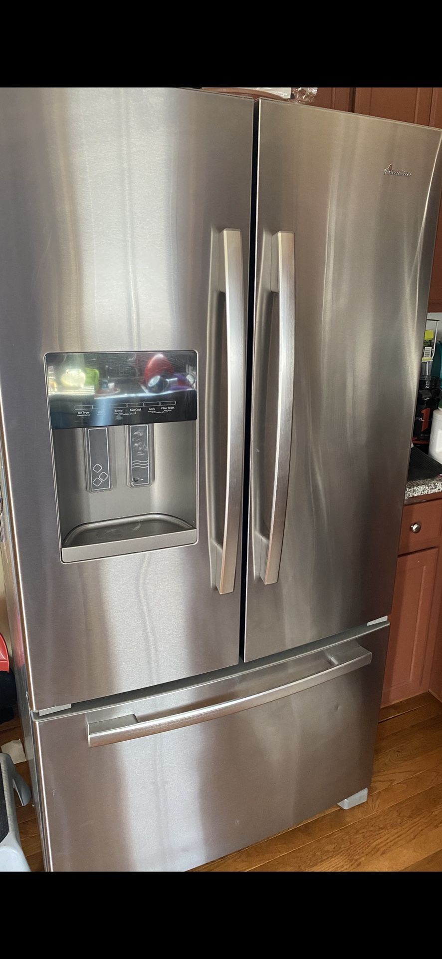 Amana French door Refrigerator water and ice dispenser only three years old model #afi2539erm01