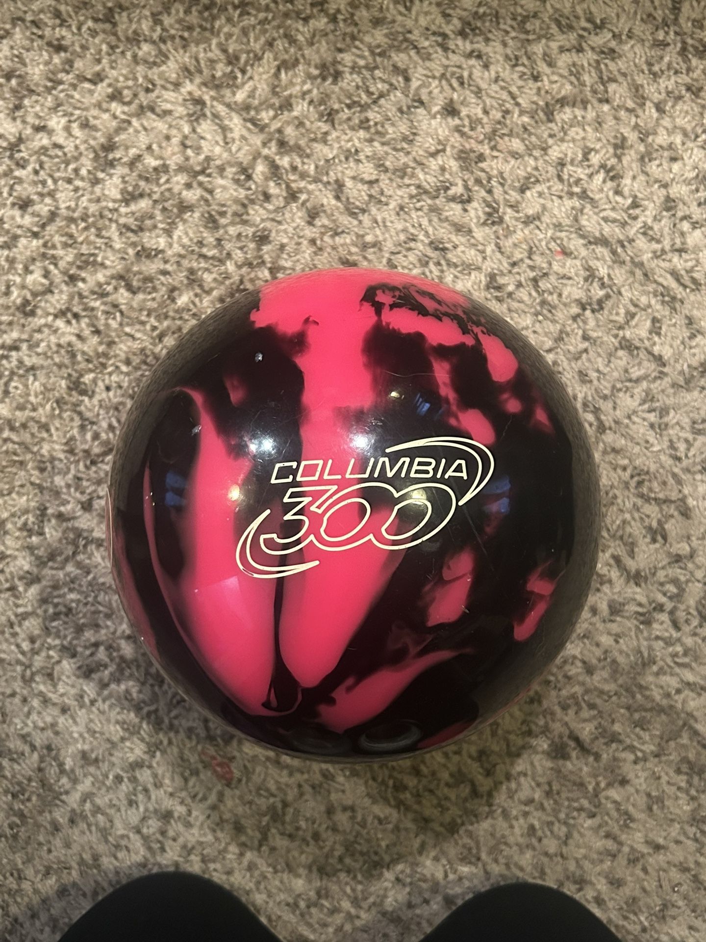 Pink and Black bowling ball