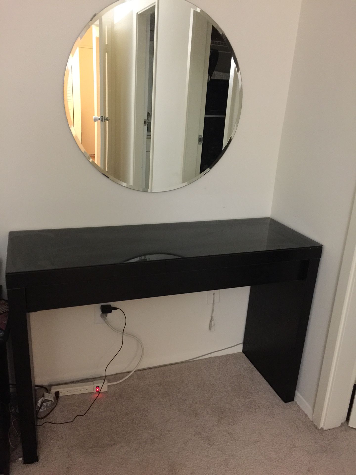 Dressing table with glass on top and mirror