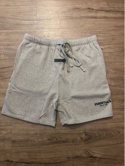 Fear of God Essentials shorts dark oat
