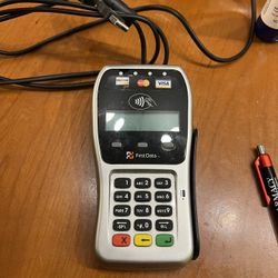 Ingenico iCT220 credit card terminal. This device is a standalone payment solution that is widely used by merchants for secure and efficient transacti