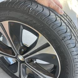 1 new spare tire,with 5x114.3 bolt pattern rim with a 215/50 R17 new Douglass Performance tire