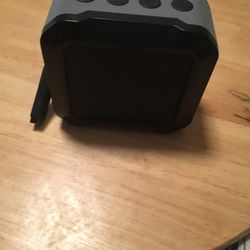 black and grey bluetooth speaker