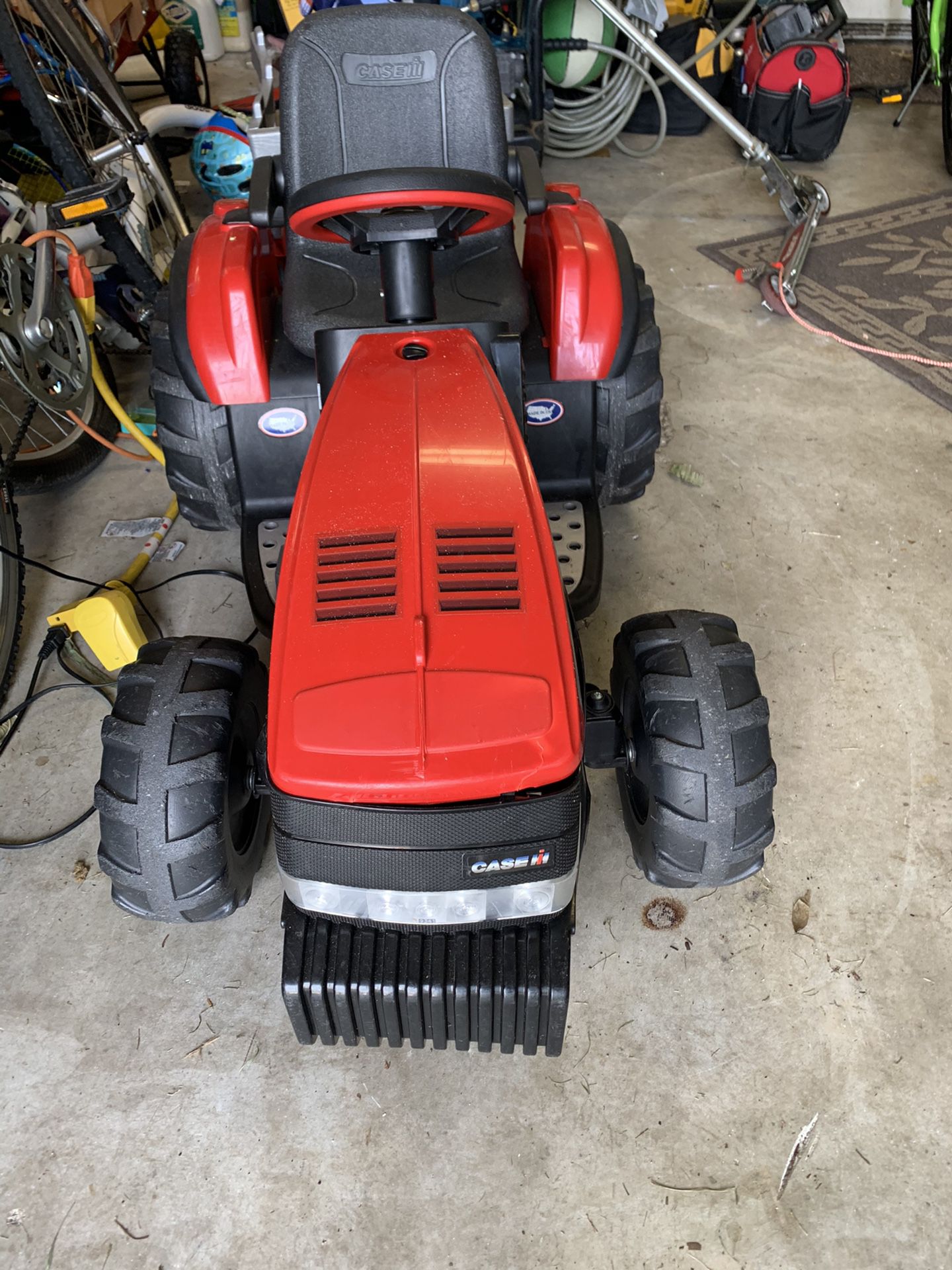 Kids riding lawn mower and trailer