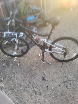 Two Huffy bikes fall suspension front and rear brakes