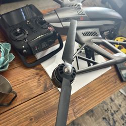 Typhoon G drone, steady grip, ground handle included, and camera included