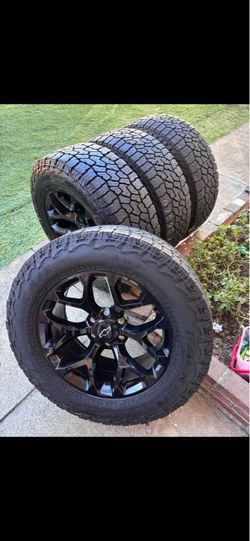 Chevy Silverado new rims used tires 275/65/20