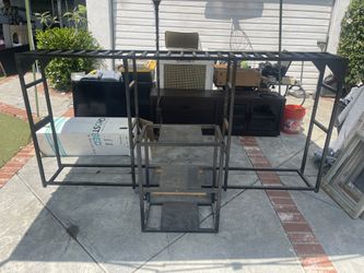 Metal rack with rollers and extra storage for metal work or woodwork