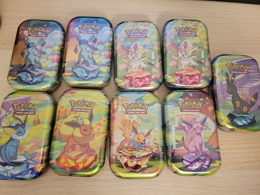9 prismatic evolutions mini tins