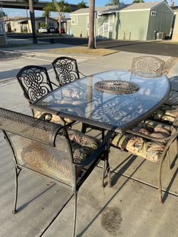 Patio table set with 6 chairs and metal iron glass table