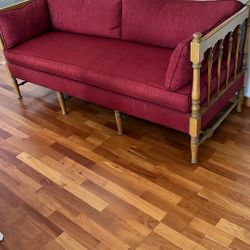 Wood Spindle Sofa.  L69” x W27” x H31”. Upholstered Base   One Long Seat Cushion  and 2 side And Back Cushions. Burgundy/Maroon