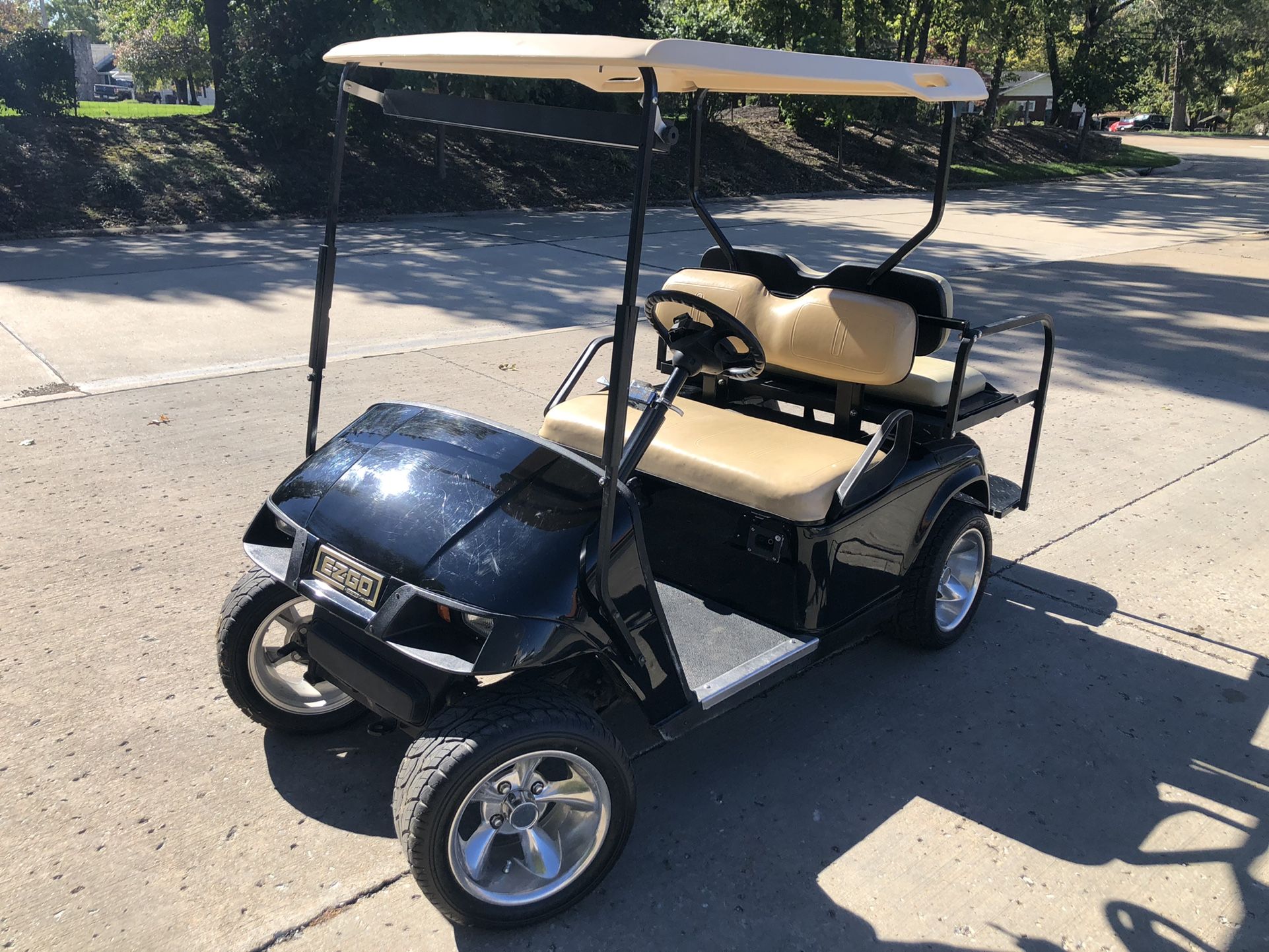  02’ Black EZ-GO 36v Electric Golf Cart w/ Chrome Rims, Mirror & Turn Signals