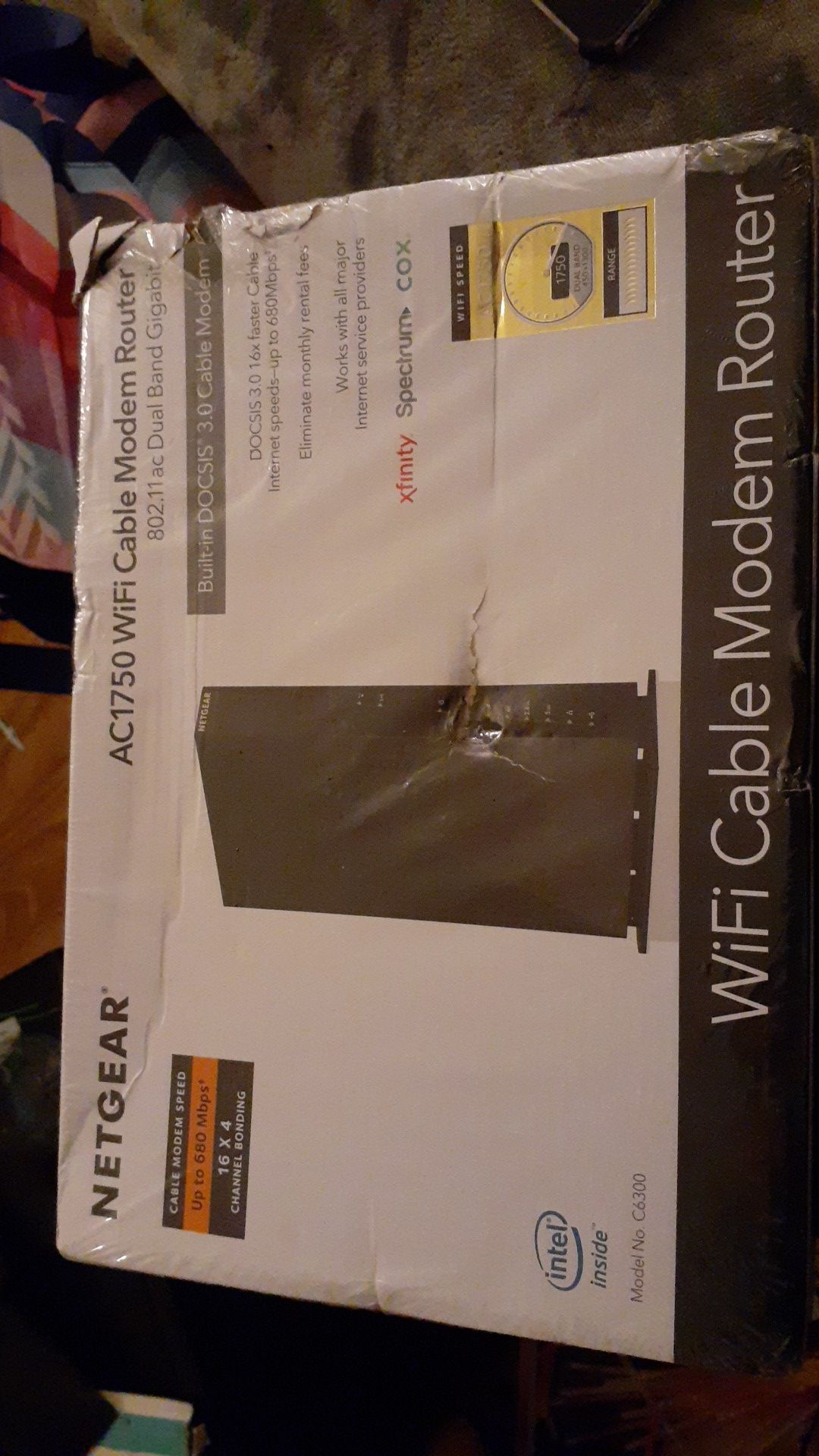 Netgear ac1750 wifi cable modem router. Brand new. Never opened. Asking 100$