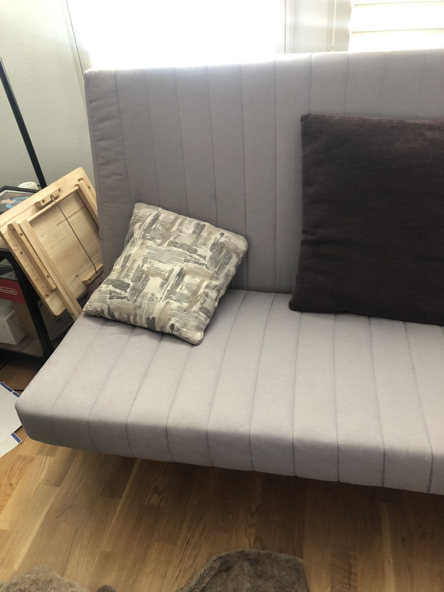 Futon grey From Ikea Metallic base Excellent condition for Sale in